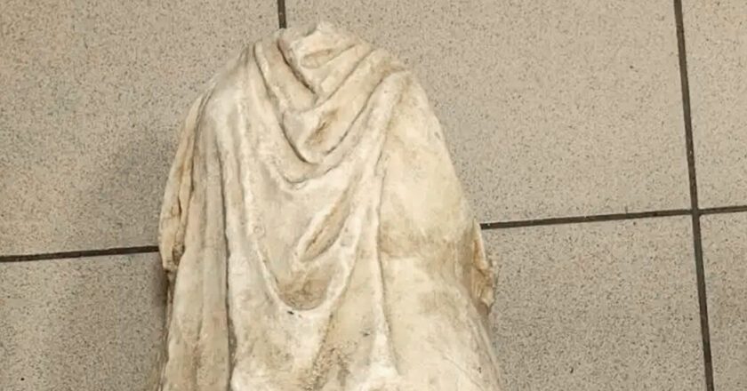 An ancient headless statue has been found in rubbish in Greece